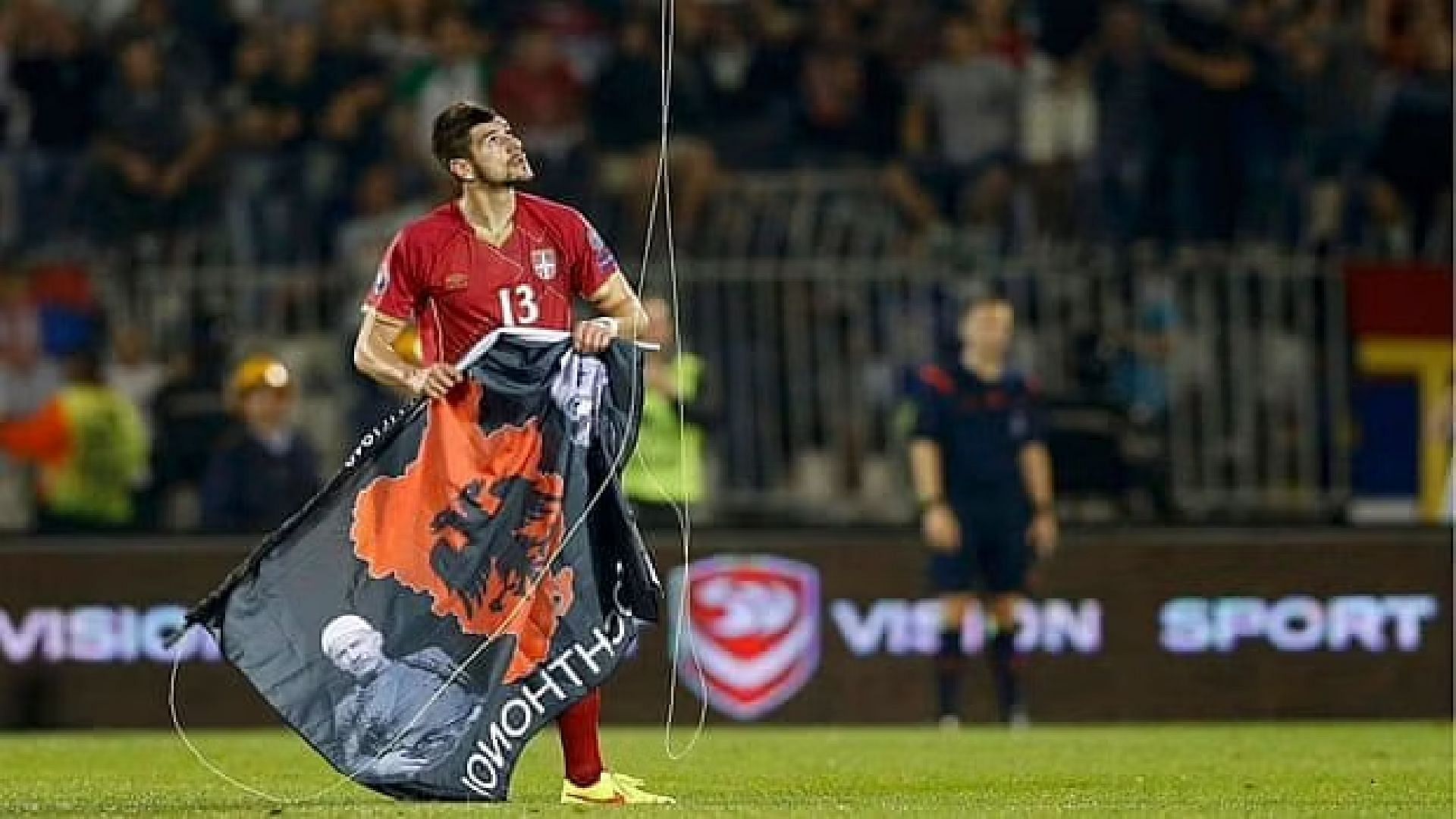 When Greater Albania's flag was flown above the stadium during the Euro 2016 qualifying match last year, Serbia's Stefan Mitrovic grabbed it. Photograph by Marko Djurica for Reuters.